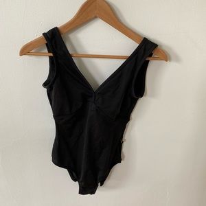Black leotard V-neck line